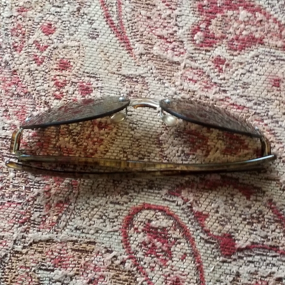 PRADA Sunglasses Model:PRADA SPR 10B Frame Color:Brushed Matte Silver Tortoise - Picture 7 of 13